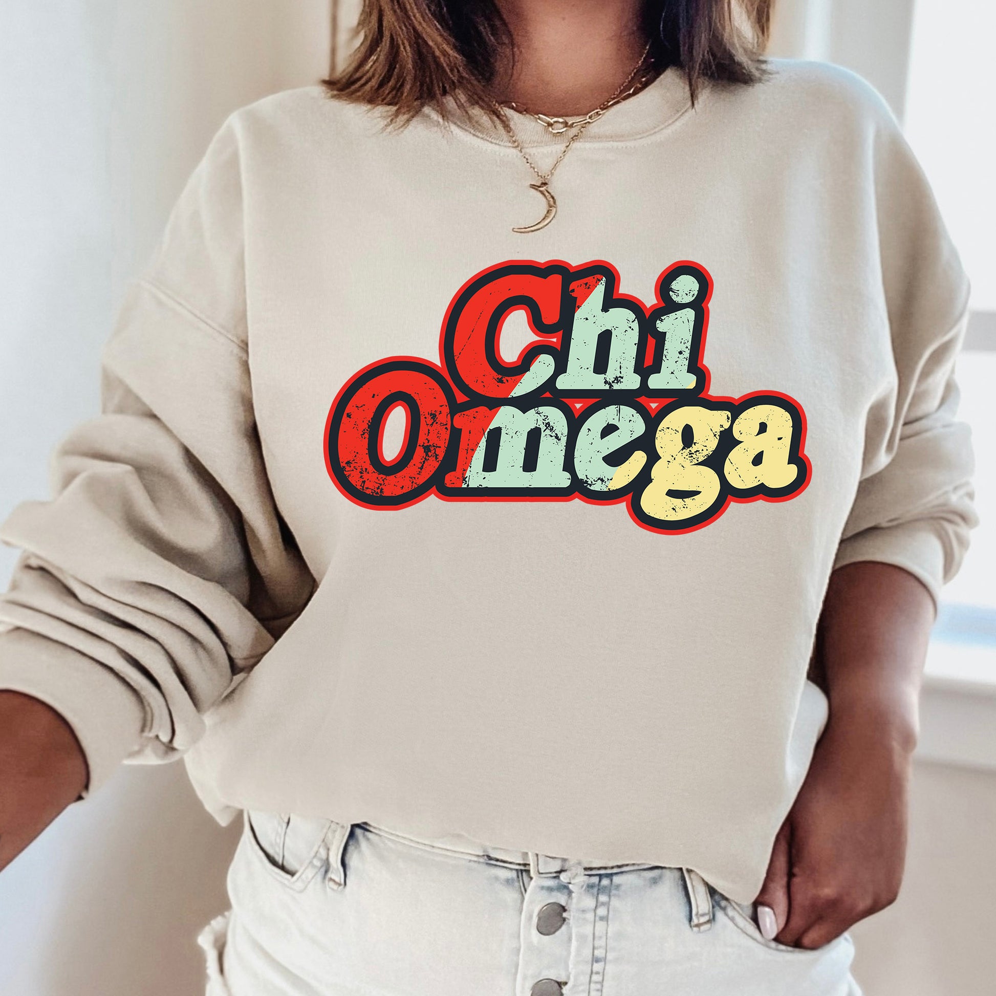 a woman wearing a sweatshirt that says chii onega