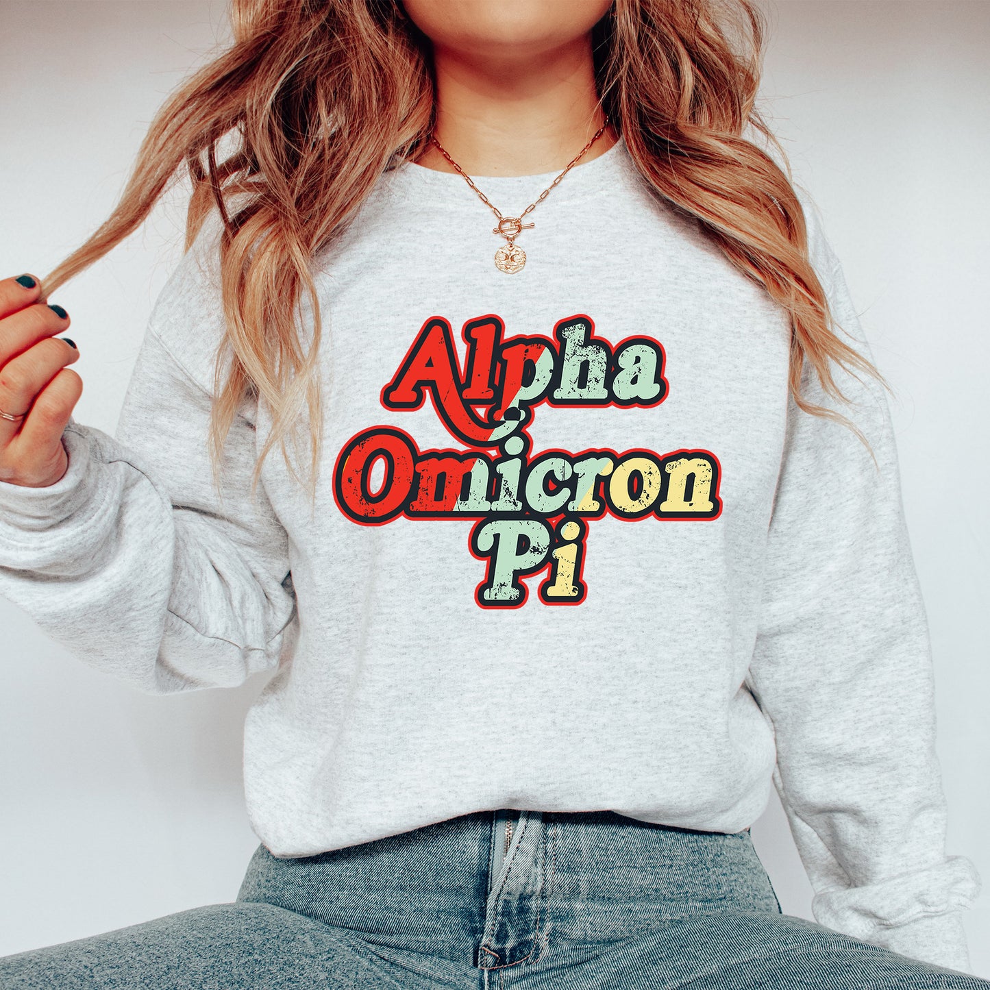 a woman wearing a sweatshirt with the words aloha unicorn pi on it