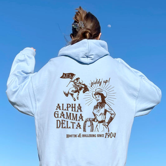 a woman wearing a white hoodie with a picture of a woman on it