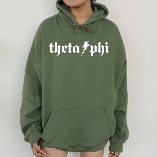 a woman wearing a green hoodie with the word'thera'printed on