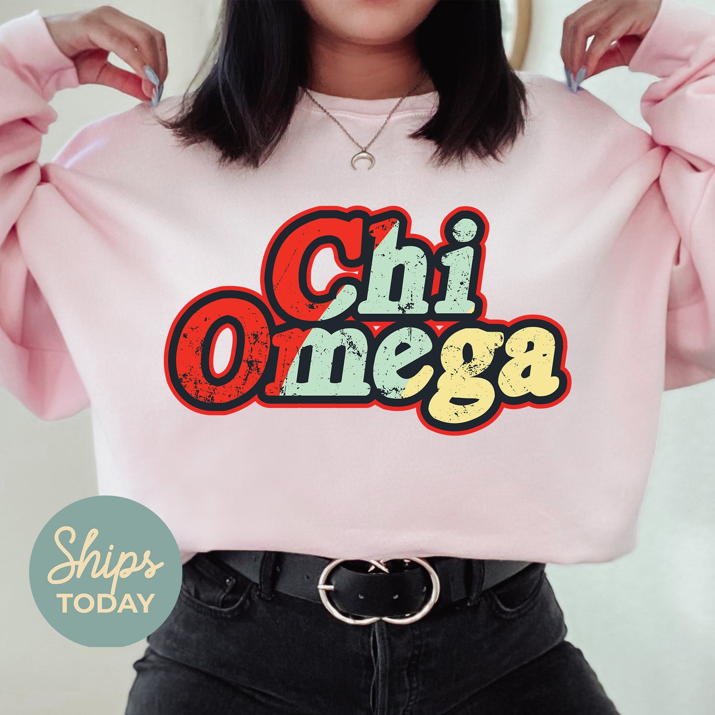 a woman wearing a pink sweatshirt that says chii onega