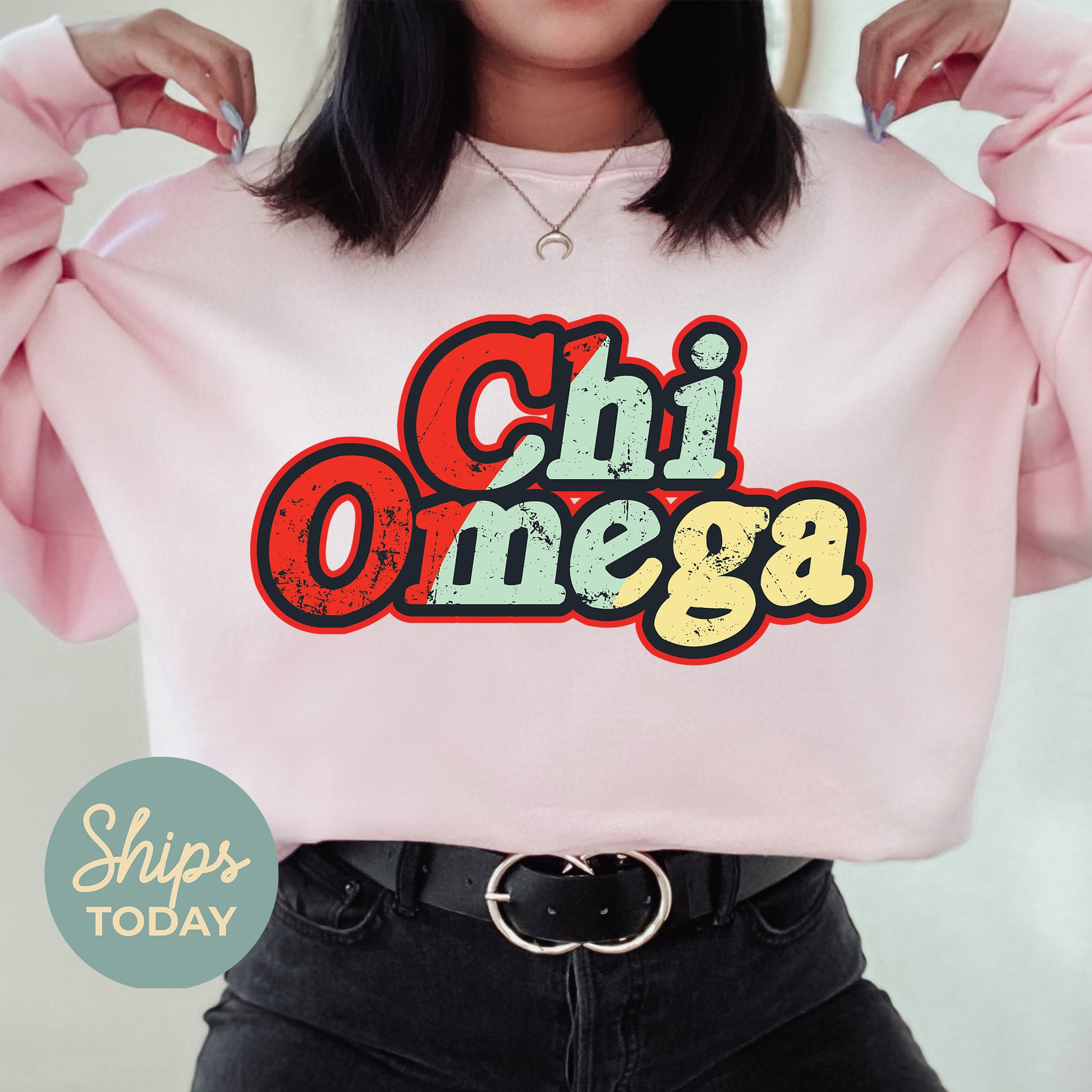 a woman wearing a pink sweatshirt that says chii onega